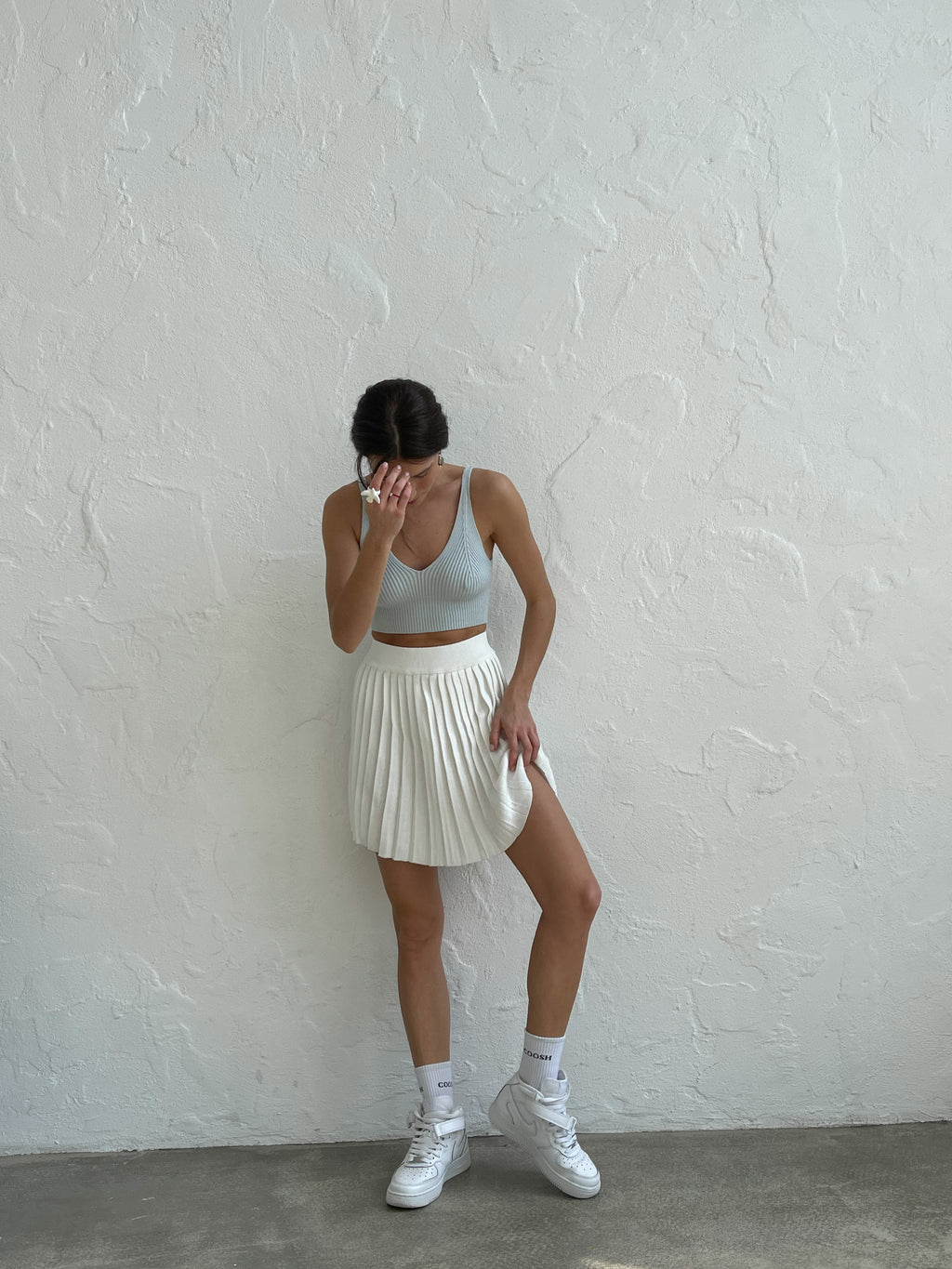 В'язана спідниця плісе