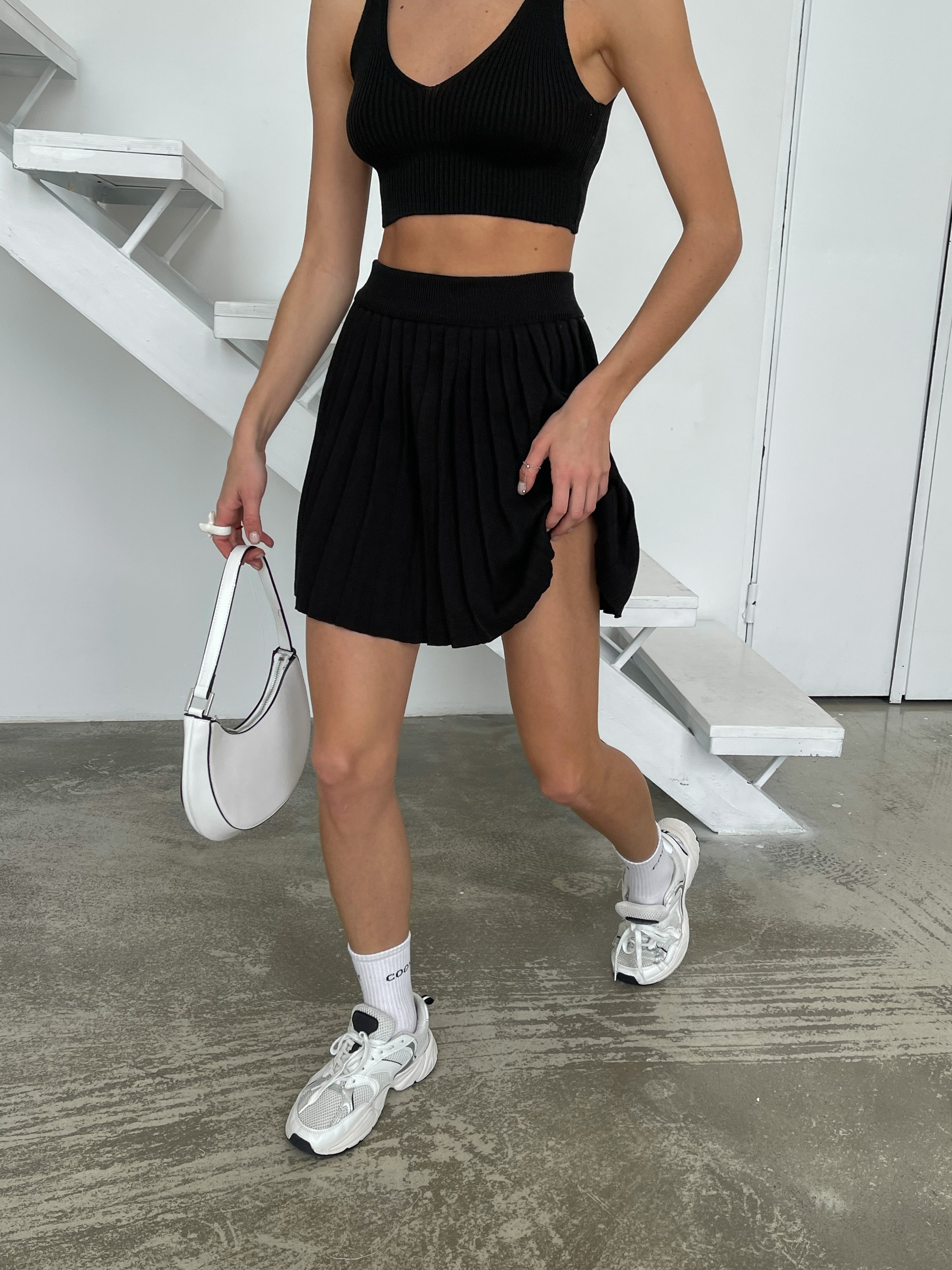 В'язана спідниця плісе