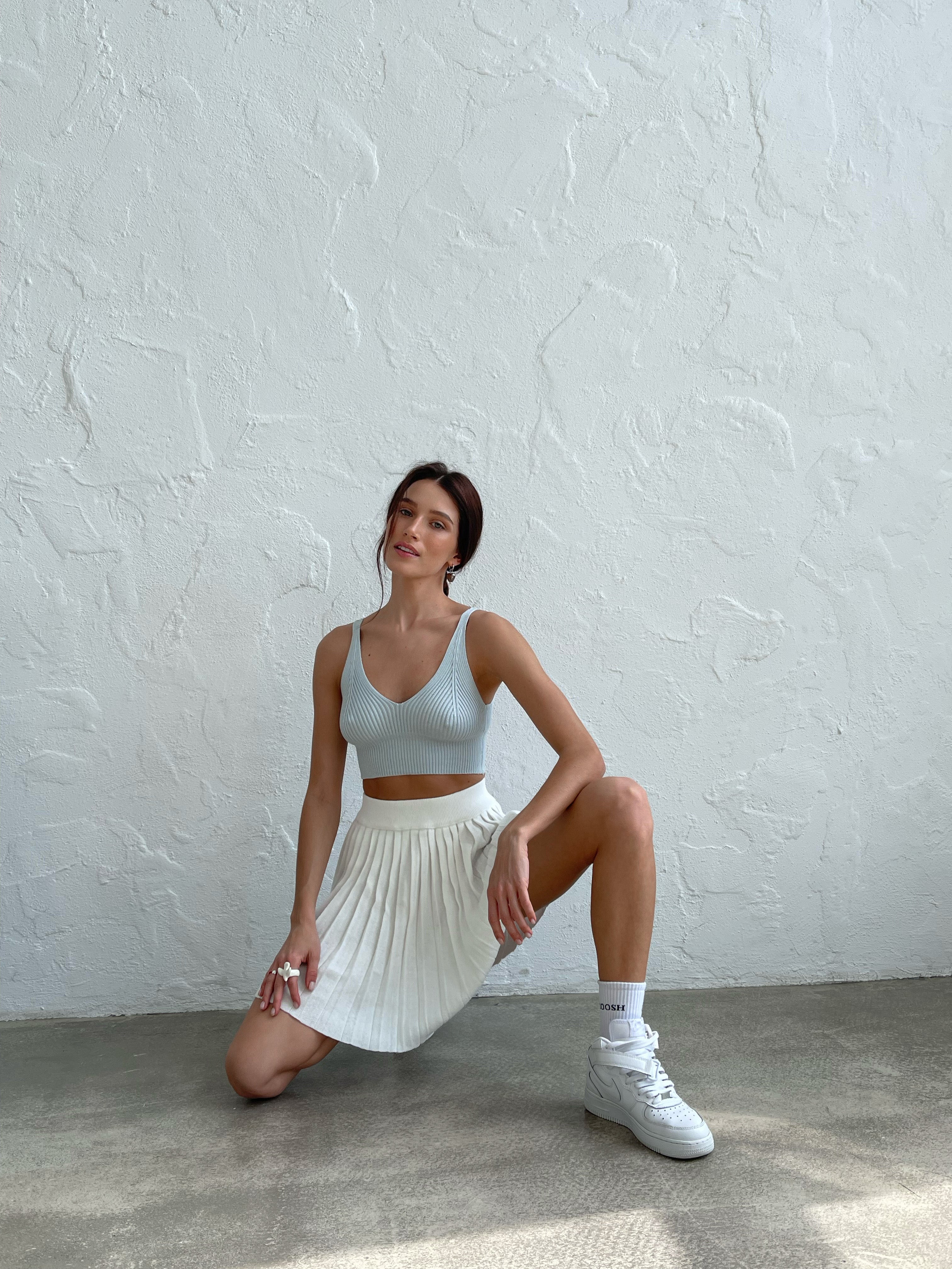 В'язана спідниця плісе