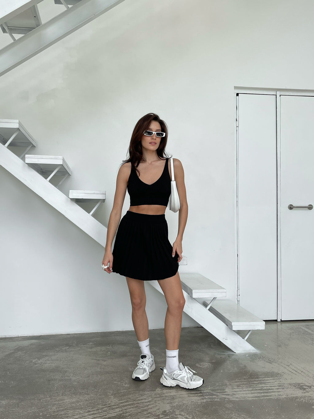 В'язана спідниця плісе